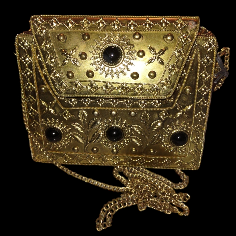 From St Xavier Clutch